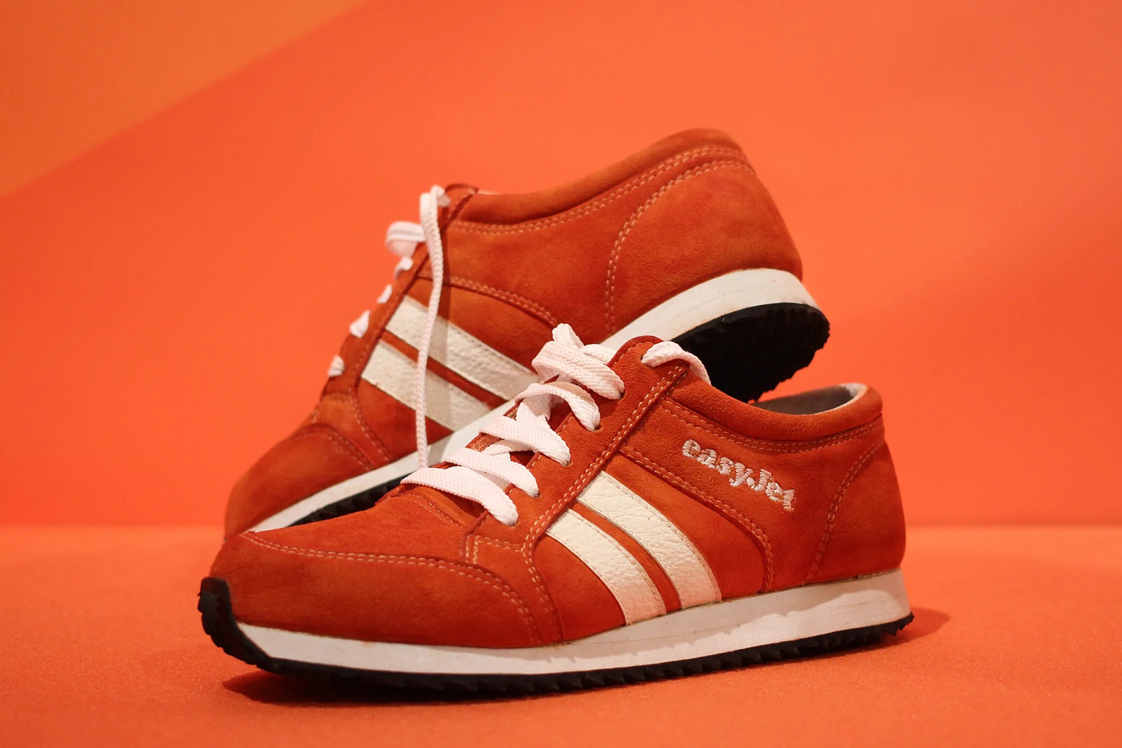 The orange Sneakair sneakers in their final production version